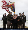 Charles Shay with soldiers from the 1st Infantry Division at Omaha Beach