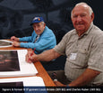 B-17 gunners sign the prints