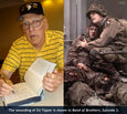 Band of Brothers veteran Ed Tipper autographs the book