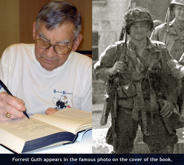 Band of Brothers veteran Forrest Guth autographs the book
