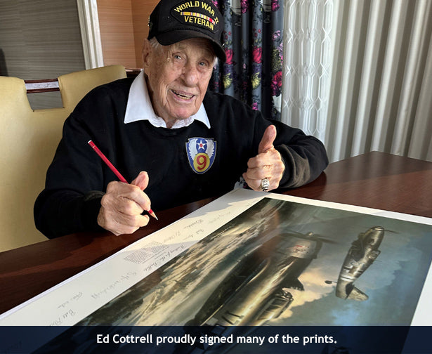 P-47 pilot Edwin Cottrell autographing prints