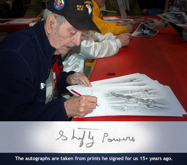 Shifty Powers autographing the prints
