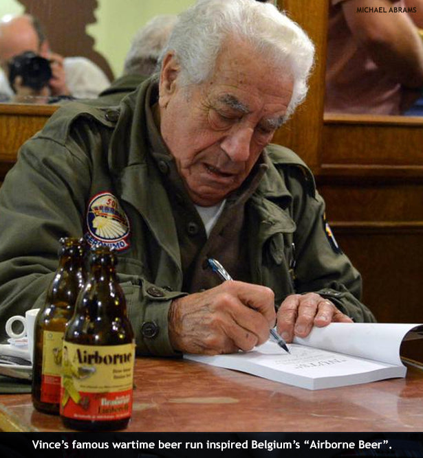 101st Airborne paratrooper Vince Speranza autographing