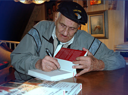 Autographed World War II history books