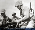Marines raise the first flag on Iwo Jima